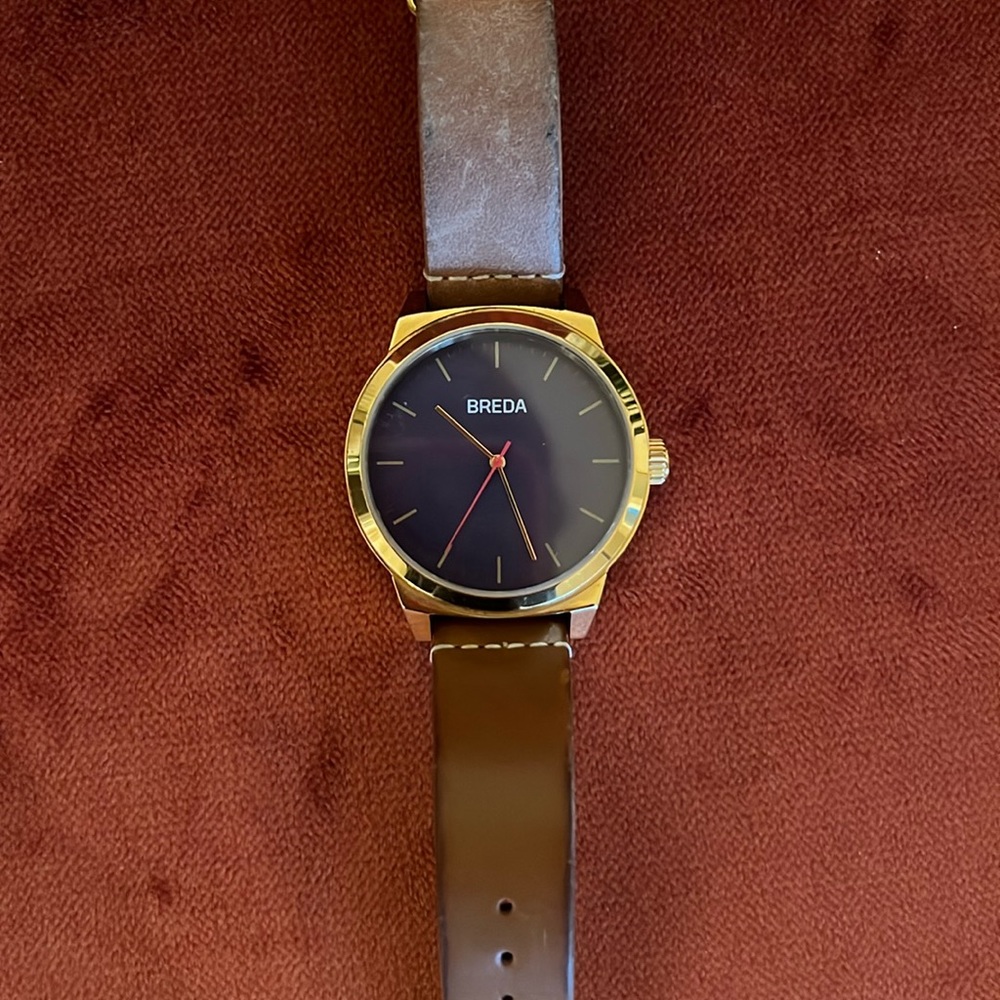 Gold Breda watch with brown leather strap